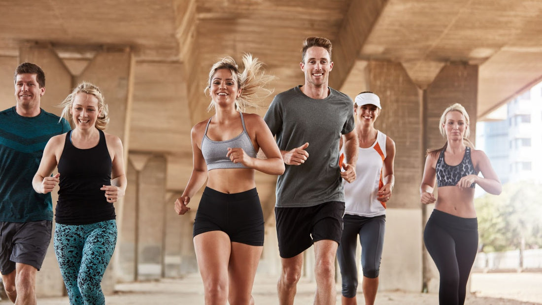A group of diverse individuals running together in a city, showcasing camaraderie in a running club activity.